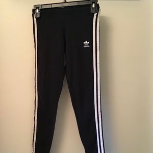 Black Adidas track pants